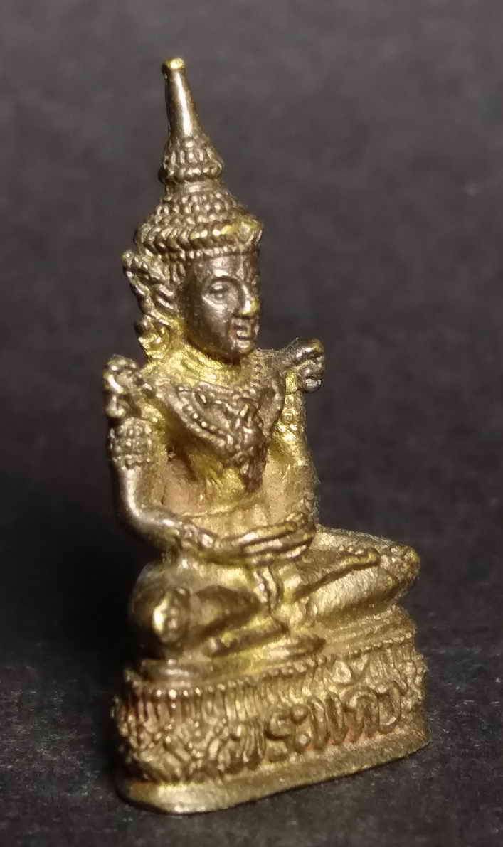 รหัสสินค้า พระกริ่ง พระหล่อ 027 รูปหล่อพระแก้วมรกต ด้านหลังมีอักษรย่อ ว.ส.ร. เนื้อทองผสมไม่ทราบที่ พระรายการนี้ให้เช่าบูชาแล้ว