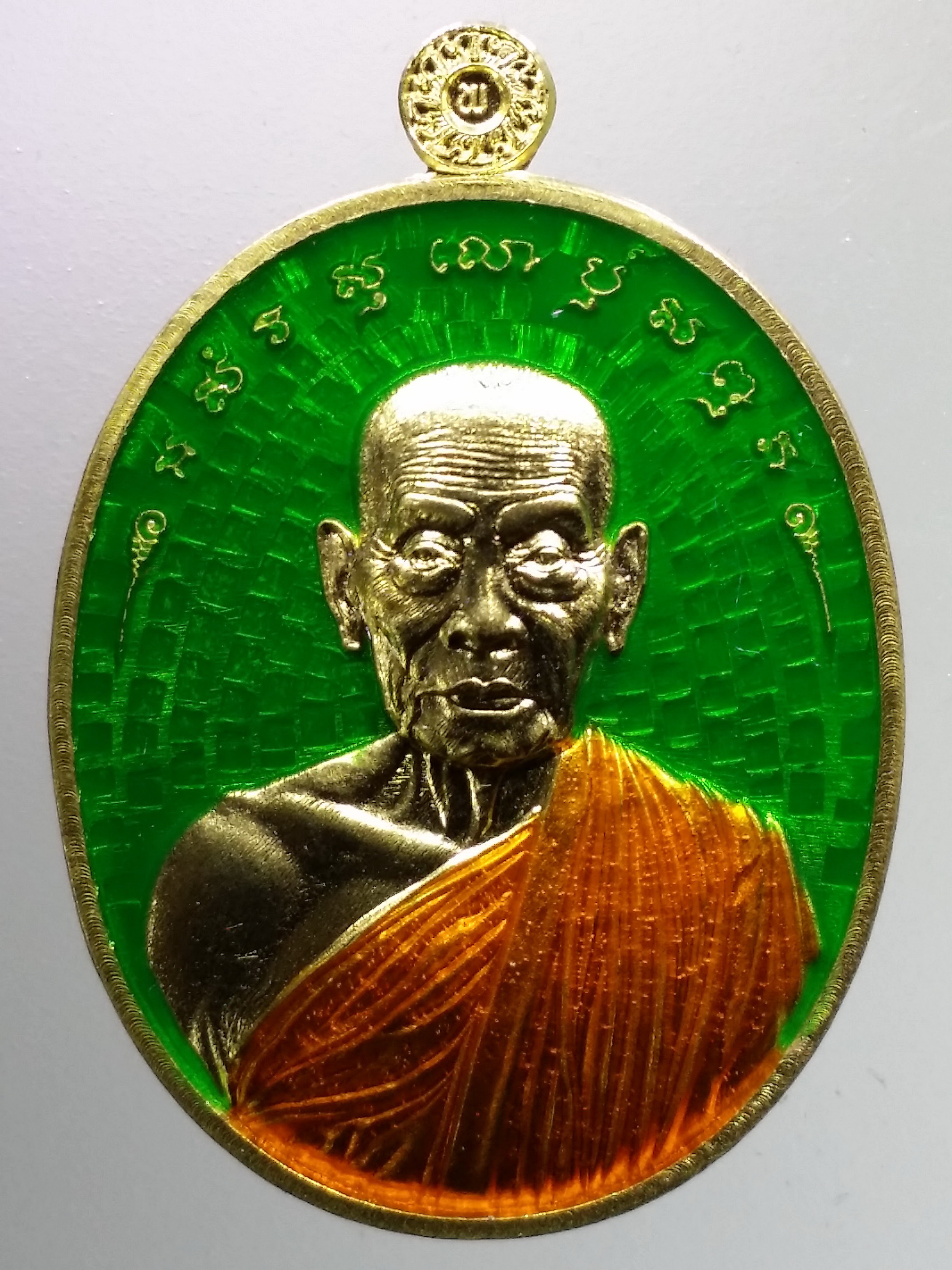 รหัสสินค้า พระมีกล่อง 1491 ชนะมาร ปี 64 หลวงพ่อพัฒน์ วัดห้วยด้วน เนื้อทองทิพย์ ลงยา สีเขียว ตอกโค๊ต ล. หมายเลข ๔๔๘
