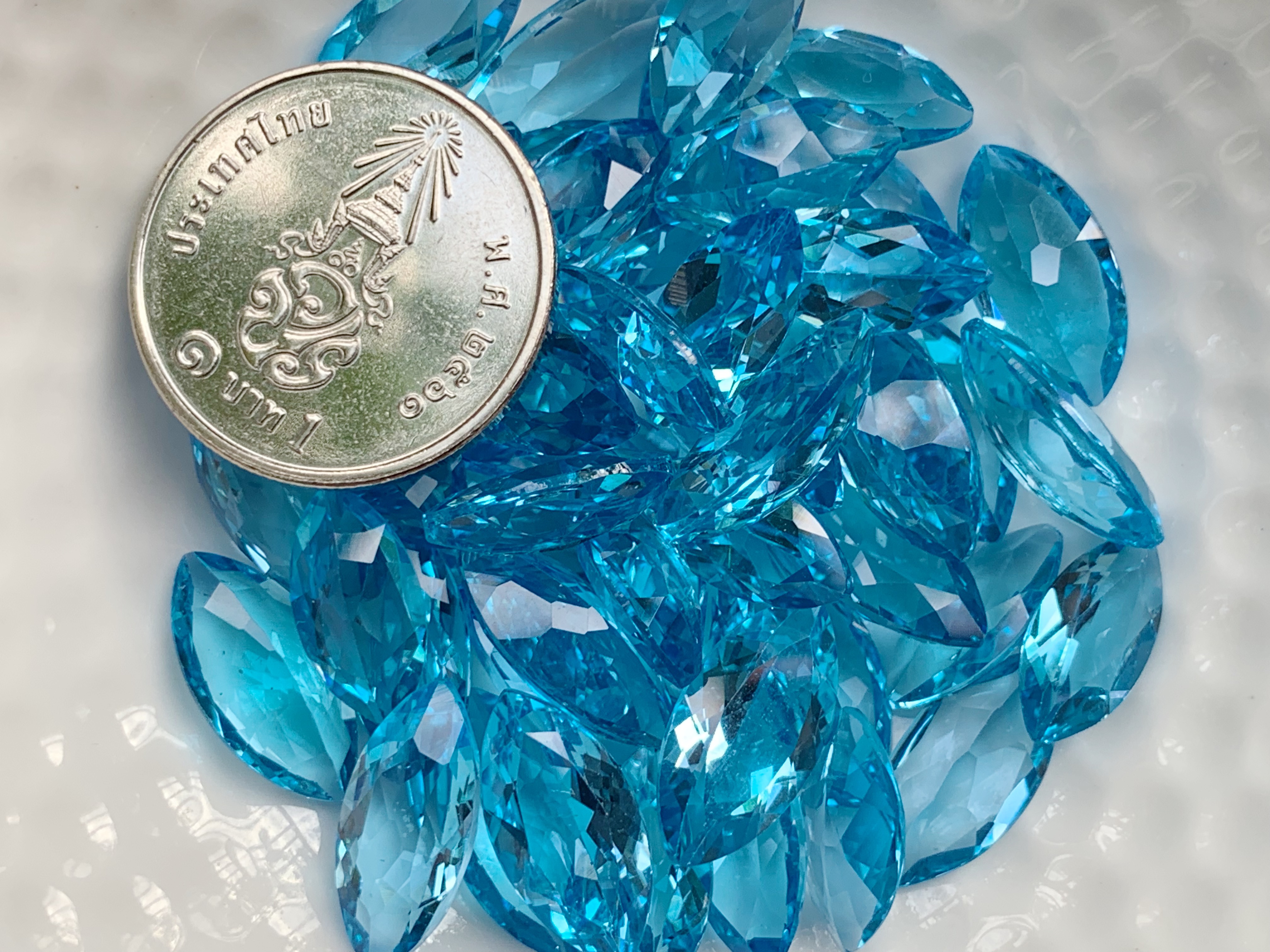 สวิสบลูโทปาสมาคี 7x14 มม. 1 เม็ด