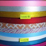 ริบบิ้นกากเพชรม้วนใหญ่ ริบบิ้นกากเพชรทึบ ริบบิ้นตราริบบอน ซัง