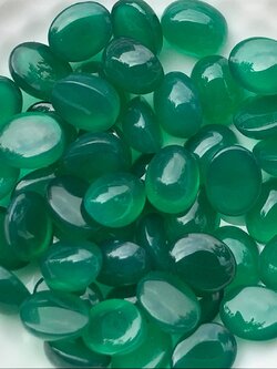 โมราไข่หลังเบี้ย 7x9mm. 10 กะรัต