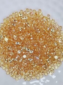 พลอยบุษราคัมกลมเจียรเหลี่ยม 1.9 มม. 1 กะรัต