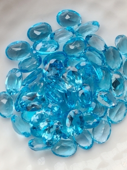 บลูโทปาสไข่ 7X5 มม. 5 กะรัต