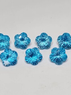 พลอยสวิสบลูโทพาส (Swiss Blue topaz) เจียรทรงดอกไม้ 9.5 มม. 1 เม็ด