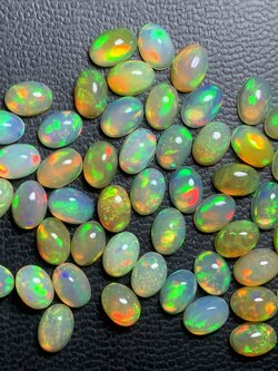 ไวท์โอปอล์ไข่ 7x5 mm. 1 เม็ด