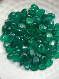 โมราไข่หลังเบี้ย 7x5mm. 10 กะรัต