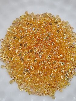 Yellow sapphire บุษราคัมกลม 1.5 มม. 1 กะรัต