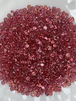 Orange-Red sapphire กลม 1.5 มม. 1 กะรัต