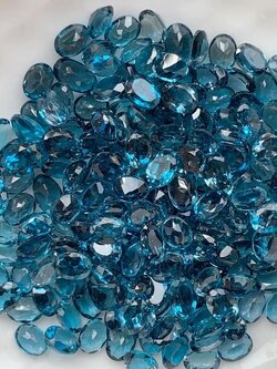 ลอนดอนบลูโทปาส 4X3 mm. 5 กะรัต